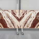 Red, beige and white onyx in slabs